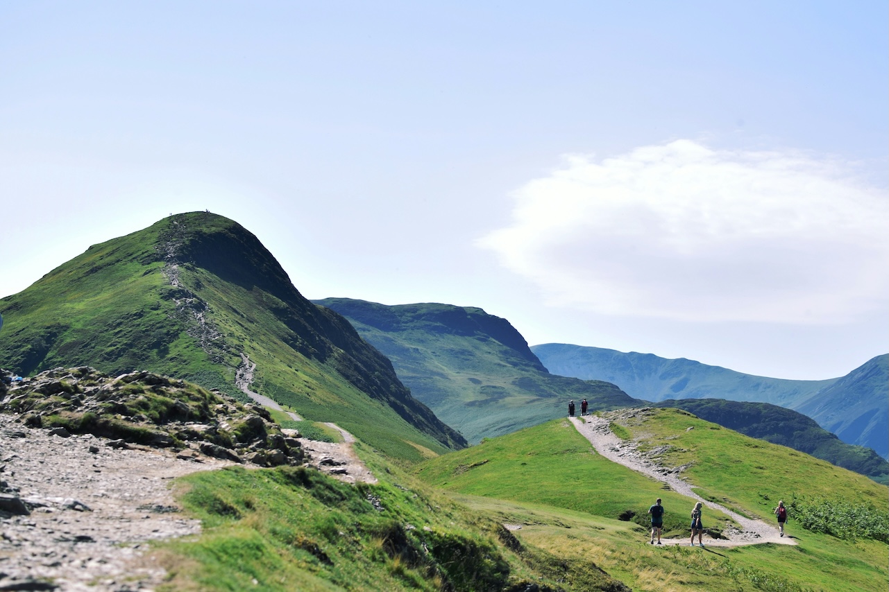 People walking up Cat Bells, Keswick, UK.